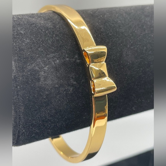 KATE SPADE TAKE A BOW GOLD TONE METAL BANGLE BRACELET Feminine Dressy Dainty - Picture 5 of 7